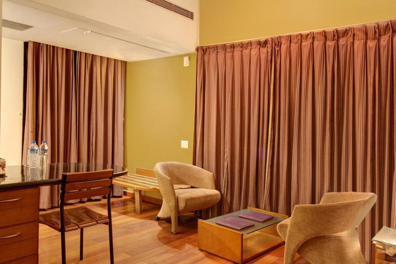 Capital O 16165 Cartier Hotel Bangalore Bagian luar foto