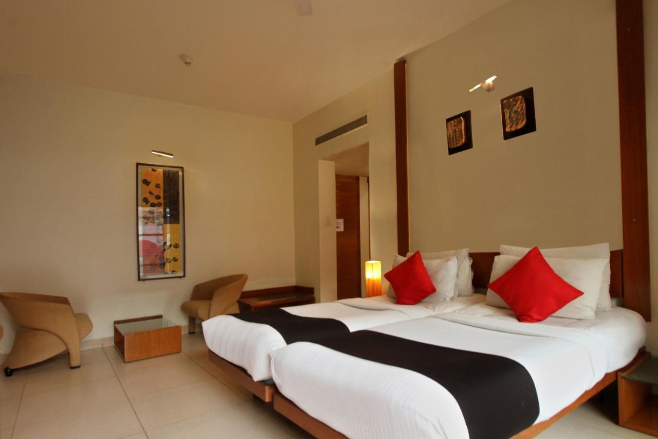 Capital O 16165 Cartier Hotel Bangalore Bagian luar foto
