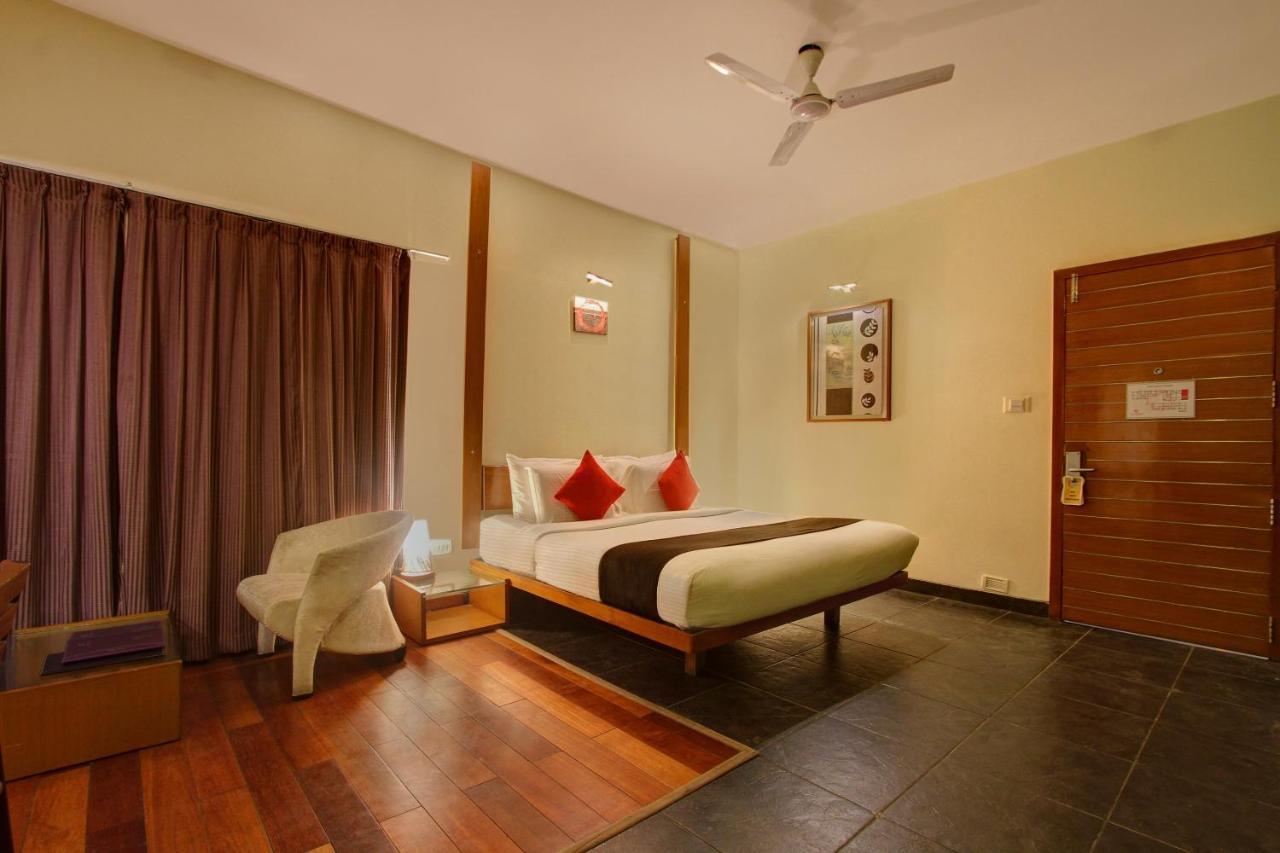 Capital O 16165 Cartier Hotel Bangalore Bagian luar foto