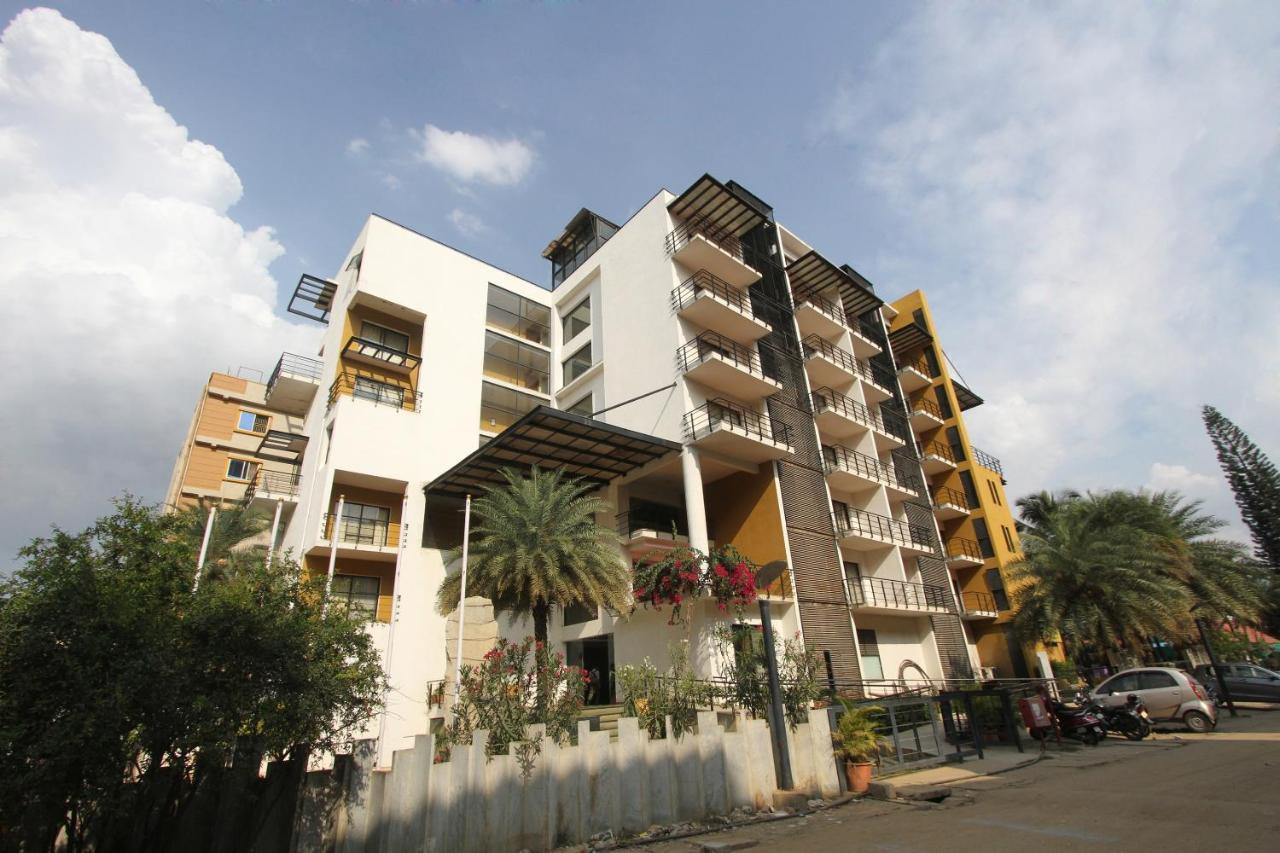 Capital O 16165 Cartier Hotel Bangalore Bagian luar foto