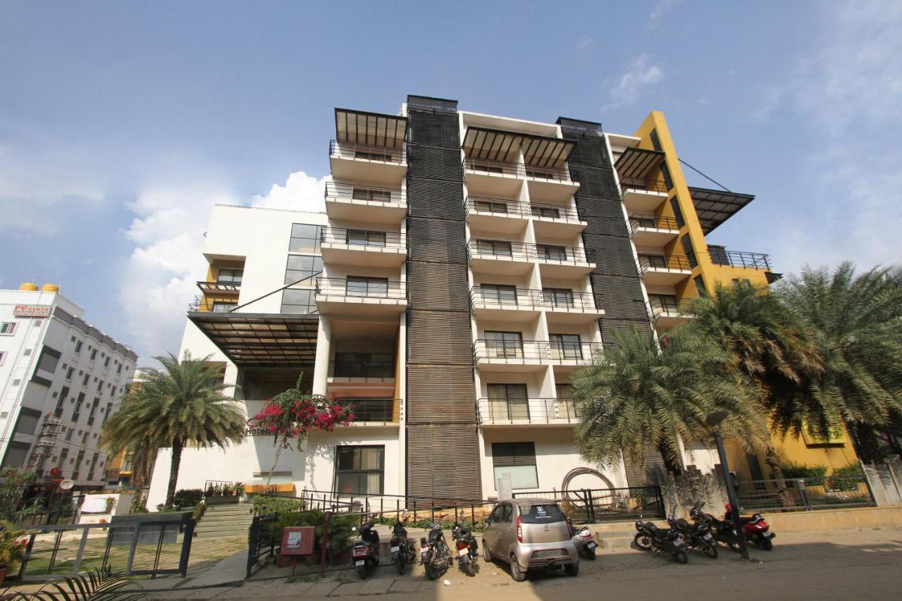 Capital O 16165 Cartier Hotel Bangalore Bagian luar foto