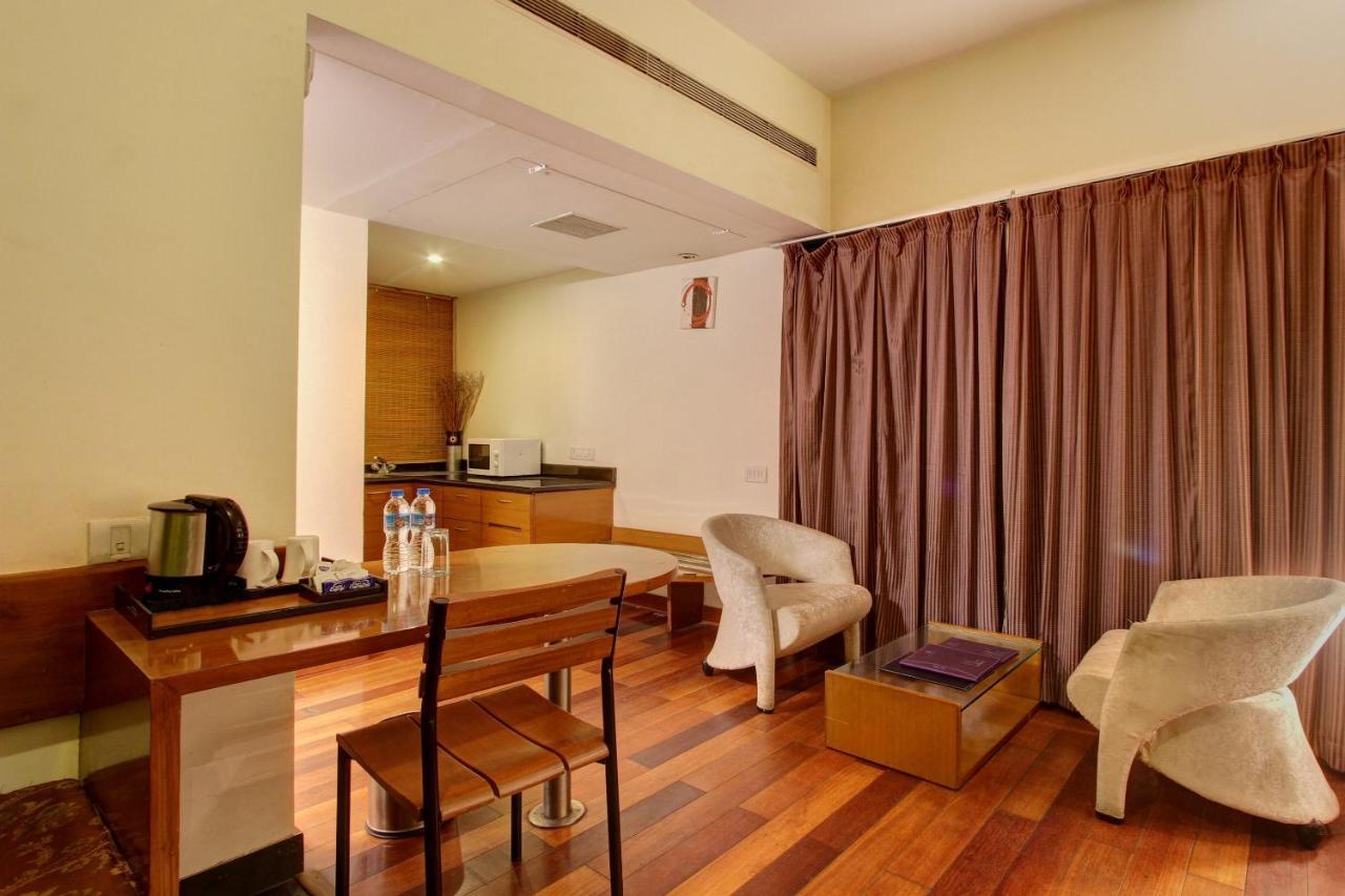 Capital O 16165 Cartier Hotel Bangalore Bagian luar foto