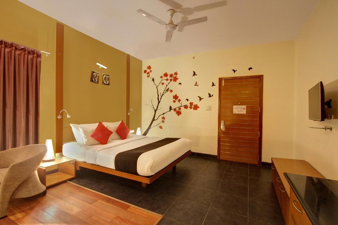 Capital O 16165 Cartier Hotel Bangalore Bagian luar foto