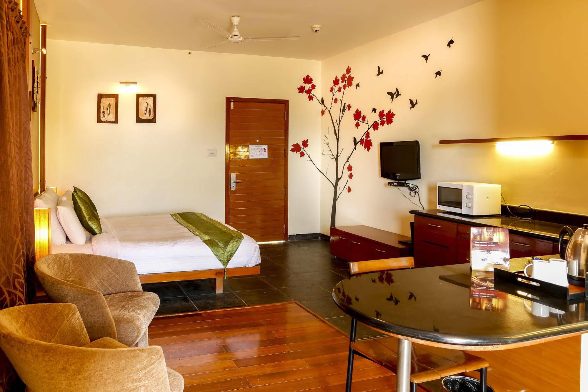 Capital O 16165 Cartier Hotel Bangalore Bagian luar foto