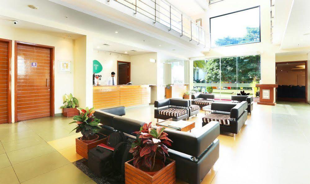 Capital O 16165 Cartier Hotel Bangalore Bagian luar foto